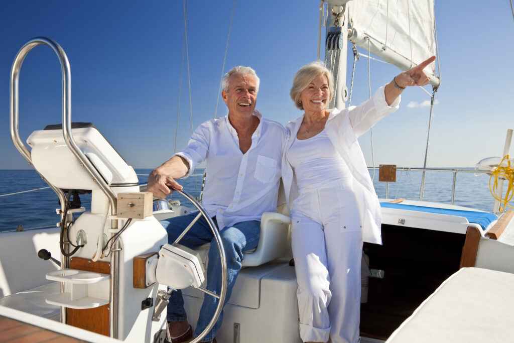 Retired couple enjoying time on a boat